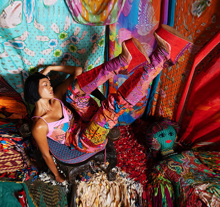 Model wearing vibrant Paul Ropp collection — bold colors handcrafted in Bali for freedom of expression
